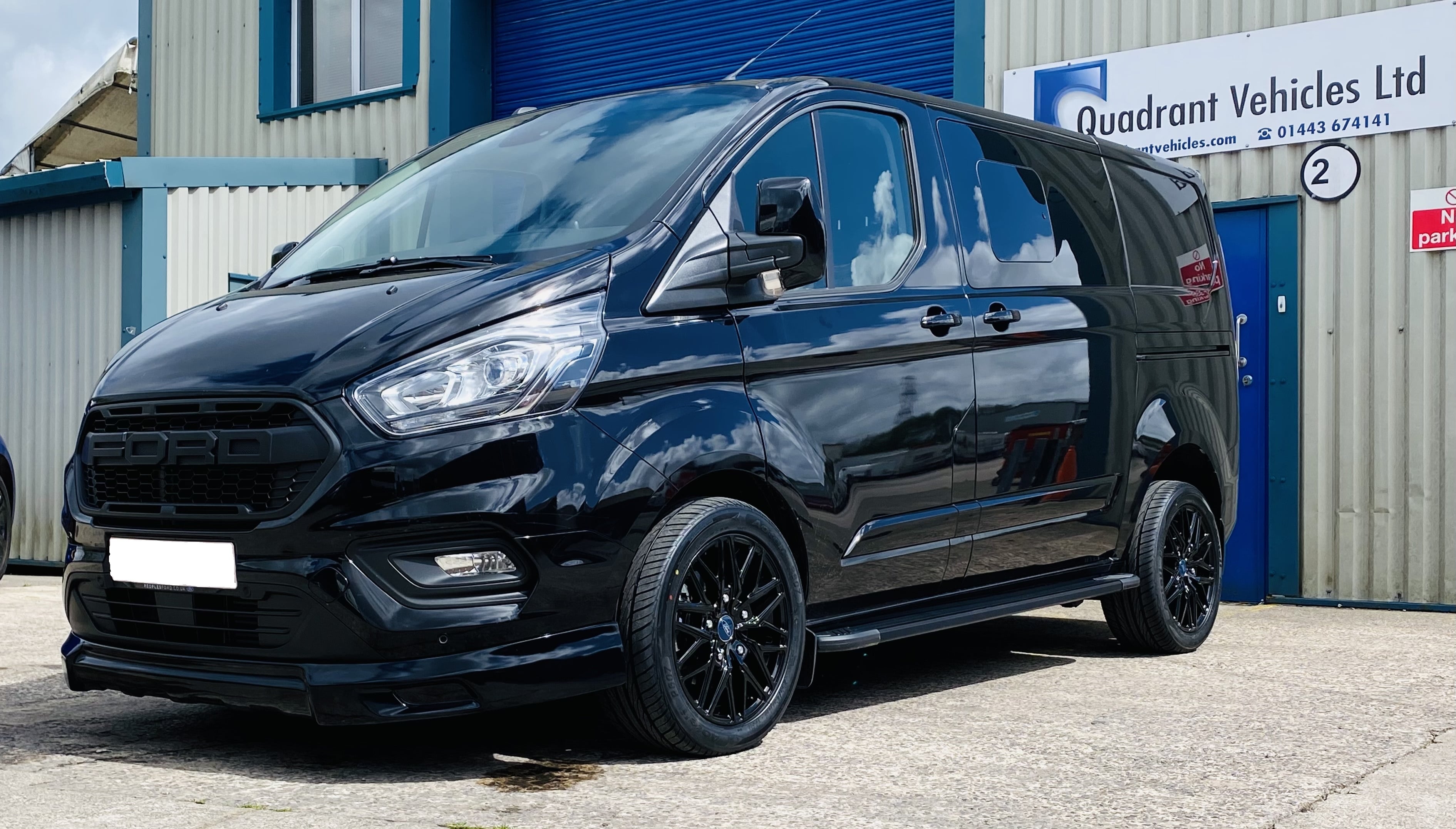 Black Ford Transit Custom Double Cab Q Sport 185ps Auto - left-side-front-angle by Quadrant Vehicles