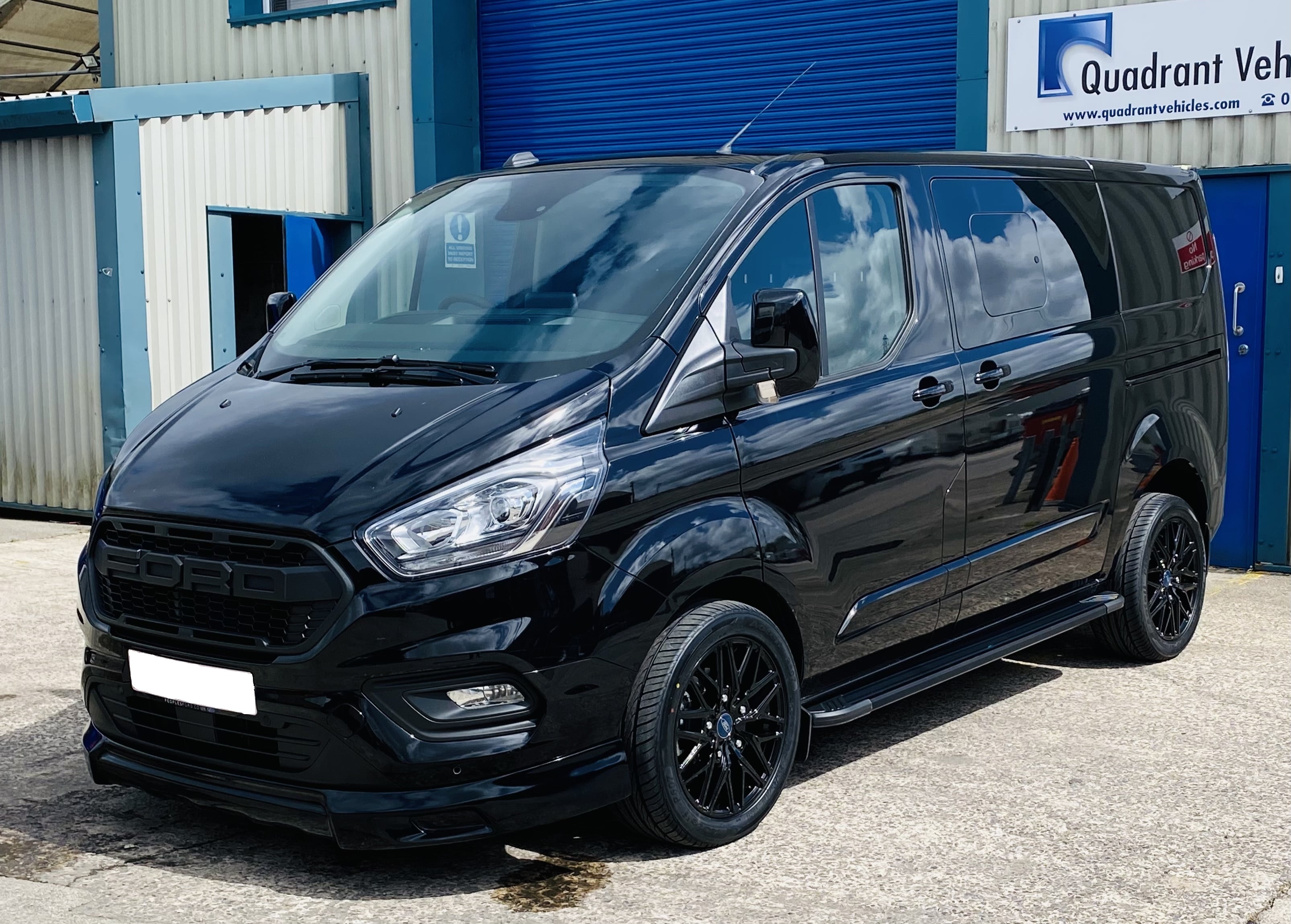 Black Ford Transit Custom Double Cab Q Sport 185ps Auto - left-side-front by Quadrant Vehicles
